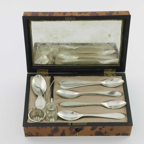 16 - An early 19th century tortoiseshell cased Dutch silver tea accoutrement set, 1816 to 1830, including... 