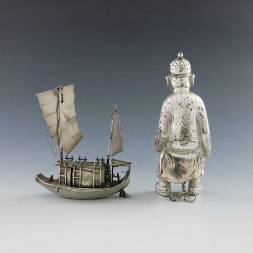 4 - A novelty Chinese white metal condiment, early 20th Century, in the form of a seated Mandarin, 12cm ... 