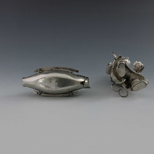 4 - A novelty Chinese white metal condiment, early 20th Century, in the form of a seated Mandarin, 12cm ... 