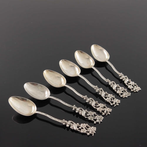 5 - A set of six Chinese export silver teaspoons, circa 1900, each cast with a pierced finial of bird in... 