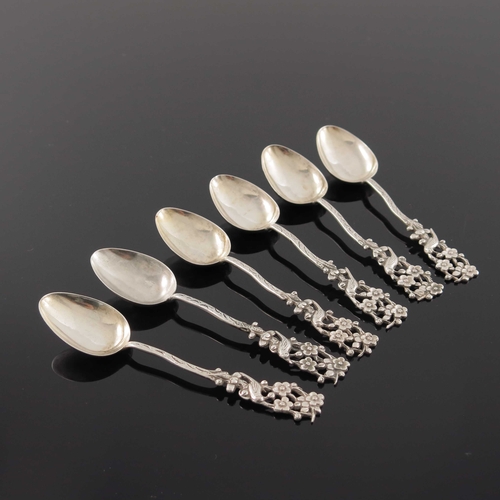 5 - A set of six Chinese export silver teaspoons, circa 1900, each cast with a pierced finial of bird in... 