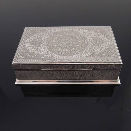 6 - A Persian silver box, probably Hussain Parvaresh, Isfahan circa 1960s, cuboid form, finely engraved ... 