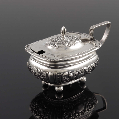 55 - A Victorian silver mustard pot, Pinder Brothers, Sheffield 1898, squat shouldered boat form, embosse... 