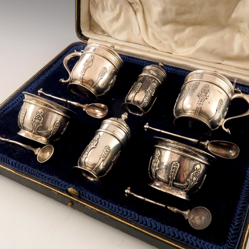 73 - A George V silver double cruet, William Lister and Sons, London 1915, footed and banded beaker form ... 