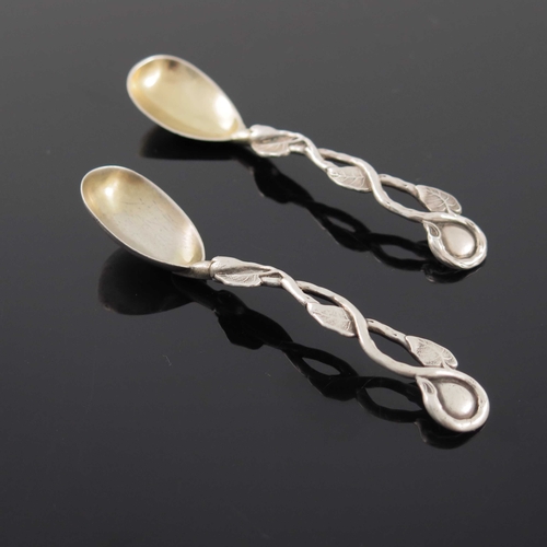 76 - A matched pair of Victorian cast silver vine handled mustard spoons, Yapp and Woodward and Joseph Wa... 