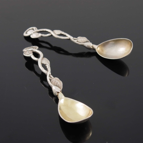 76 - A matched pair of Victorian cast silver vine handled mustard spoons, Yapp and Woodward and Joseph Wa... 