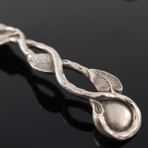 76 - A matched pair of Victorian cast silver vine handled mustard spoons, Yapp and Woodward and Joseph Wa... 