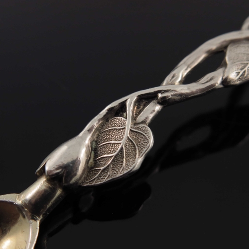 76 - A matched pair of Victorian cast silver vine handled mustard spoons, Yapp and Woodward and Joseph Wa... 