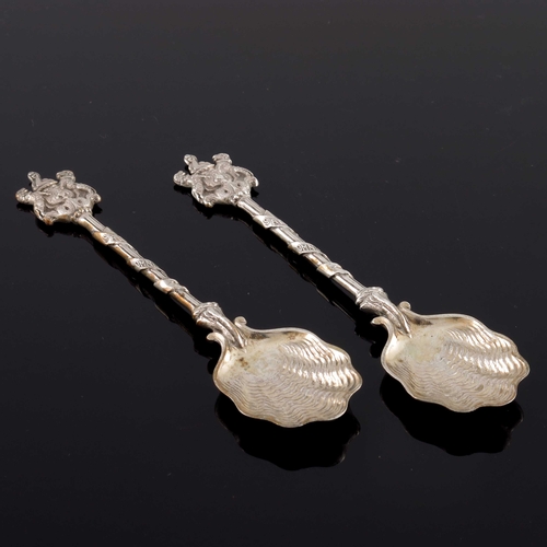 77 - A pair of Edwardian silver commemorative spoons, Carrington and Co., London 1905, cast shell bowls a... 