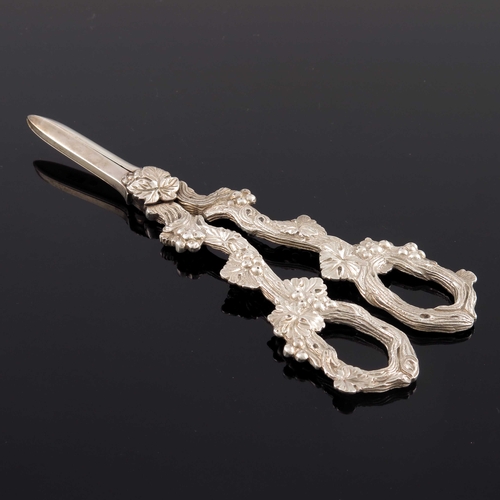 81 - A pair of Edwardian cast silver grape scissors, William Hutton and Sons, London 1901, the handles mo... 