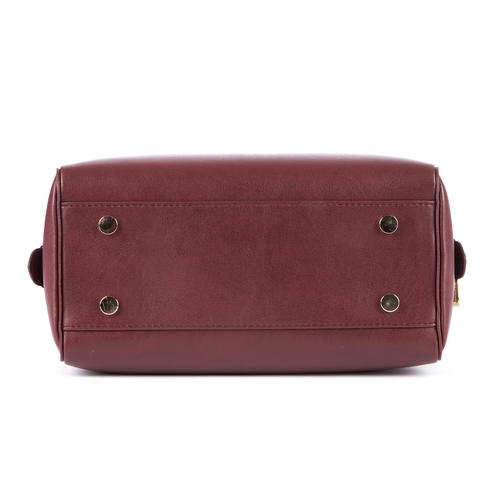 10 - Aspinal of London, a burgundy Pearl Boston bag, handmade from the finest smooth Italian calf leather... 