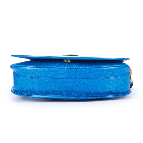 24 - Cartier, a Must De Cartier crossbody handbag, crafted from blue grained leather, featuring maker's f... 