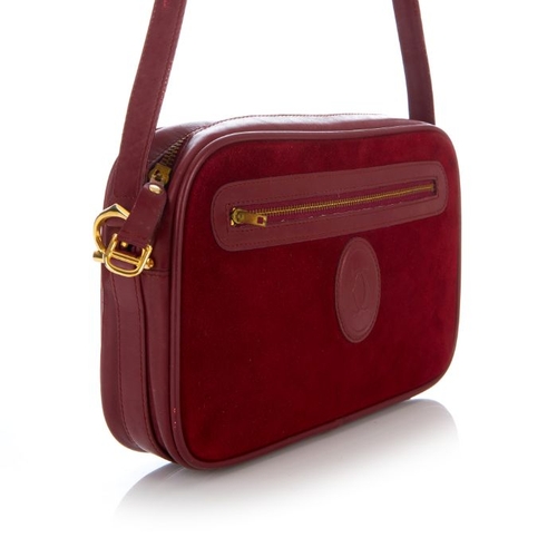 27 - Cartier, a vintage Bordeaux camera bag, crafted from burgundy suede with smooth burgundy leather tri... 