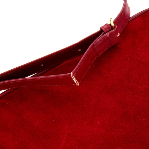 27 - Cartier, a vintage Bordeaux camera bag, crafted from burgundy suede with smooth burgundy leather tri... 