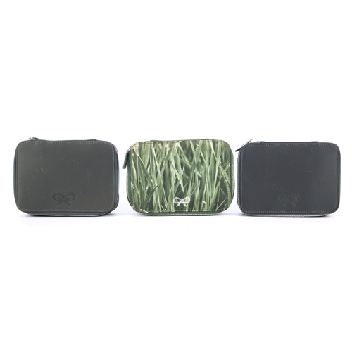 6 - Anya Hindmarch, four cosmetic pouches, to include a beige canvas example picturing Imperial Airways ... 