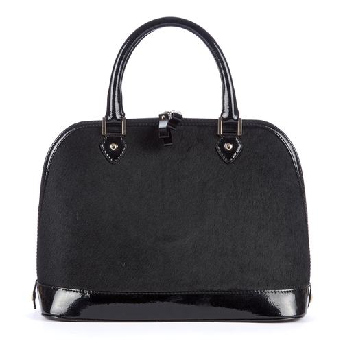 9 - Aspinal of London, a Hepburn handbag, designed with a black pony hair exterior and black patent leat... 