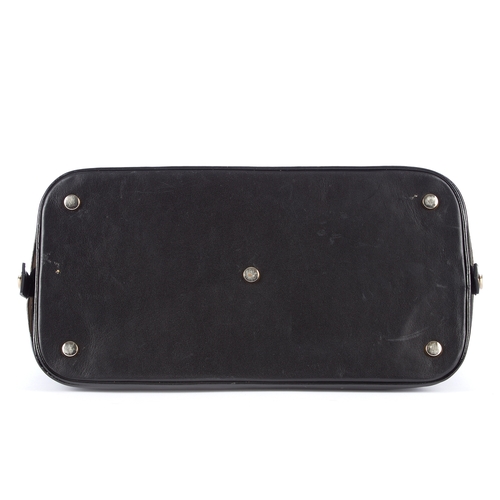 9 - Aspinal of London, a Hepburn handbag, designed with a black pony hair exterior and black patent leat... 
