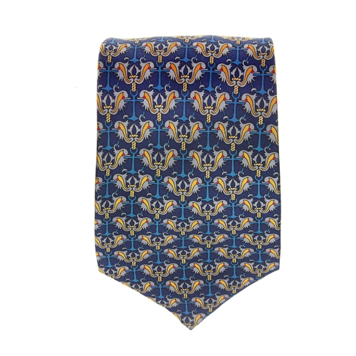 183 - Hermes, a silk tie, featuring a blue and yellow design, with maker's label, no. 7255 and box