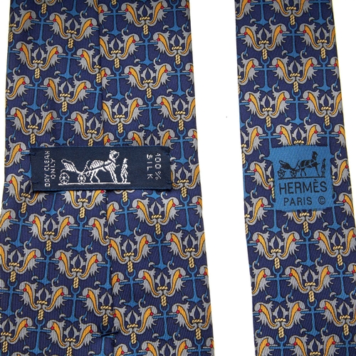 183 - Hermes, a silk tie, featuring a blue and yellow design, with maker's label, no. 7255 and box