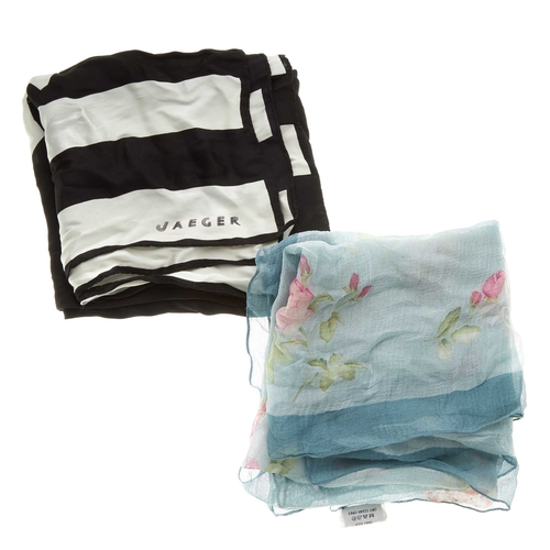 185 - Jaeger, four silk scarves, two include a pink and white floral scarf and a white a blue nautical sca... 