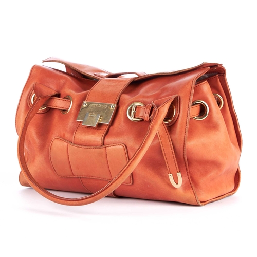 189 - Jimmy Choo, a peach leather handbag, with gold-tone hardware, double rolled leather handles, thin wr... 
