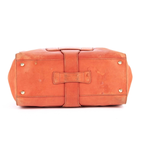 189 - Jimmy Choo, a peach leather handbag, with gold-tone hardware, double rolled leather handles, thin wr... 