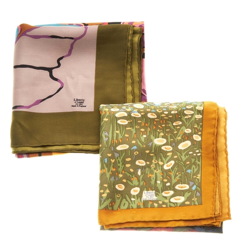 196 - Liberty of London, two silk scarves, to include a multicoloured scarf featuring a boat on water, tog... 