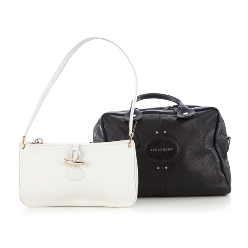 198 - Longchamp, two leather handbags, to include a white leather baguette handbag featuring a single leat... 