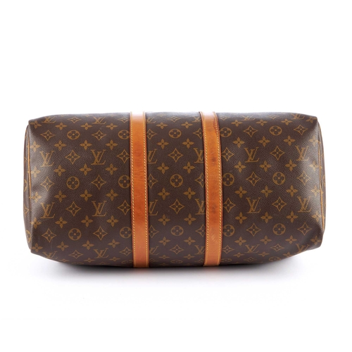206 - Louis Vuitton, a monogram Keepall 45 luggage bag, designed with vachetta natural leather trim, rolle... 