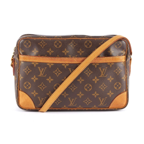 219 - Louis Vuitton, a monogram Trocadero handbag, designed with natural tan leather trim, front slip pock... 