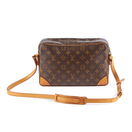219 - Louis Vuitton, a monogram Trocadero handbag, designed with natural tan leather trim, front slip pock... 