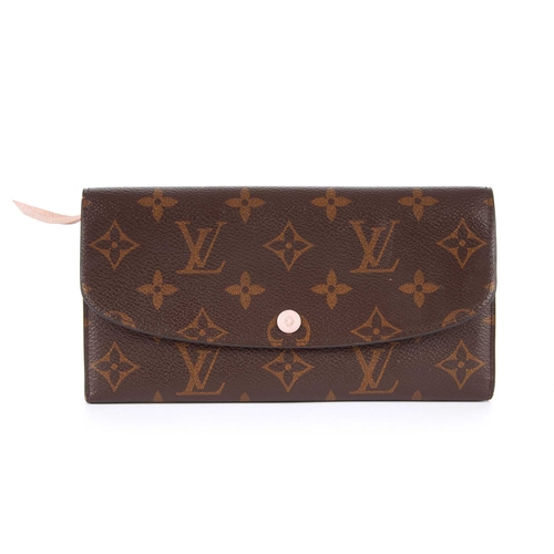 225 - Louis Vuitton, a monogram Emilie wallet, crafted from maker's monogram coated canvas, featuring a fr... 