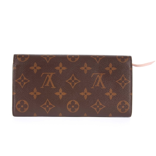 225 - Louis Vuitton, a monogram Emilie wallet, crafted from maker's monogram coated canvas, featuring a fr... 