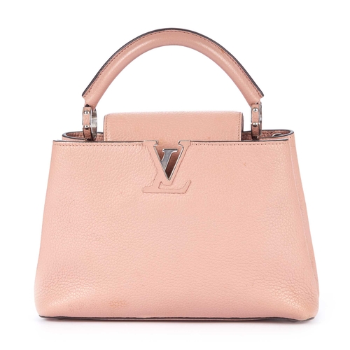 229 - Louis Vuitton, a Capucines BB handbag, crafted from dusty pink taurillon leather with contrasting bl... 