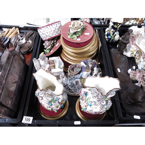 109 - Ceramics including Capodimonte, Dresden  and English floral encrusted figures and vases.  (2 trays)