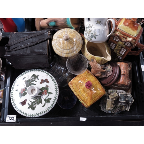 123 - A collection of Staffordshire cottage ware including coffee pot and cover, butter dish, biscuit jar ... 