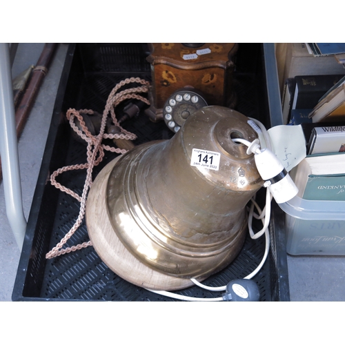 141 - An Elizabeth II bronze ship's bell, dated 1954, converted to a lamp, together with marquetry inlaid ... 