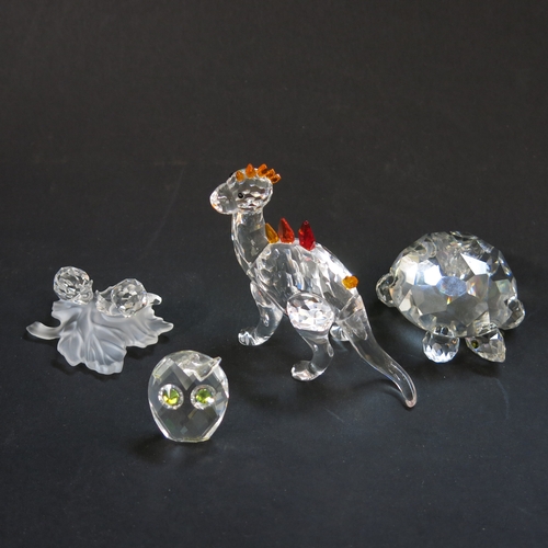 162 - Swarovski crystal ornaments including dinosaur, snail group, tortoise and owl  (4)