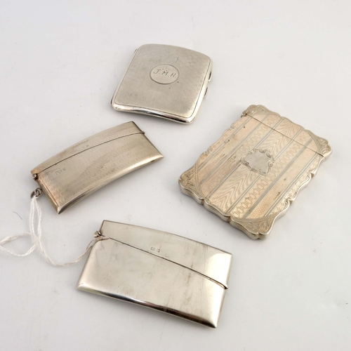 86 - Four Victorian and later silver card cases, one castle top form, engine turned, two of hip fitting f... 