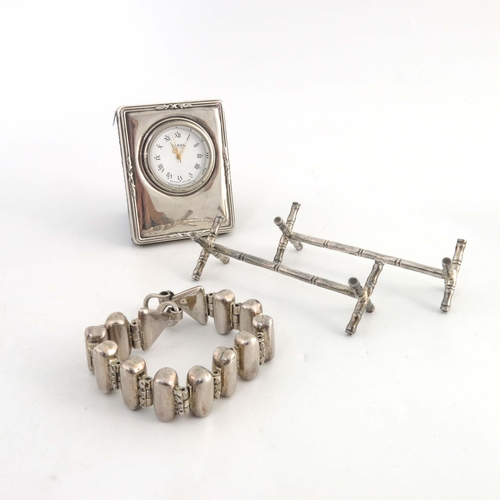 88 - A pair of Sterling silver knife rests, modelled as bamboo, together with a Carrs silver timepiece an... 