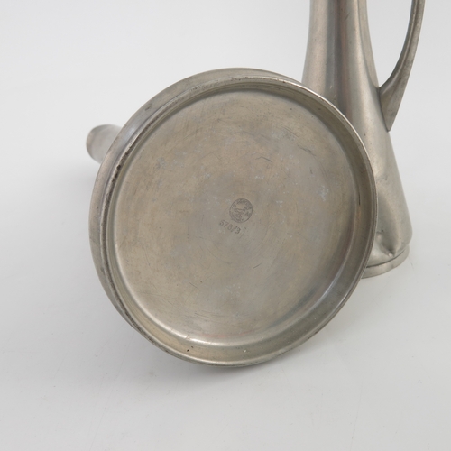 89 - A graduated pair of Norwegian Modernist pewter jugs, Brodrene Mylius, trumpet form with whiplash han... 