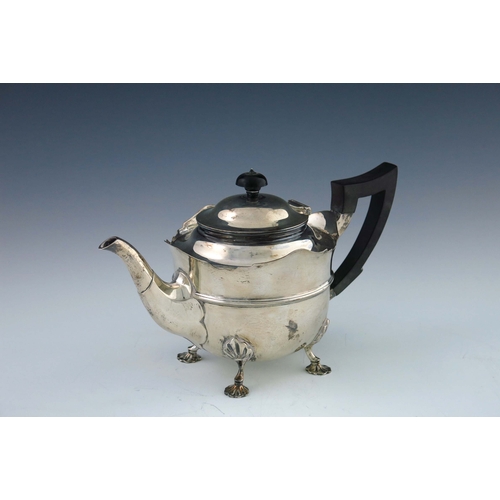 104 - An Edwardian silver teapot, Martin, Hall and Co., Sheffield 1901, banded round bowl form, ogee rim, ... 