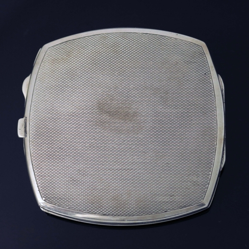 115 - A George VI silver and enamelled compact, Joseph Gloster Ltd., Birmingham 1937, cushioned square sec... 