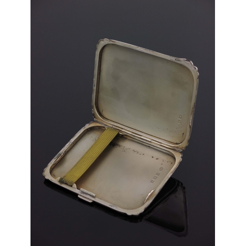 116 - A George VI silver and enamelled cigarette case, Adie Brothers, Birmingham 1950, cushioned rectangul... 