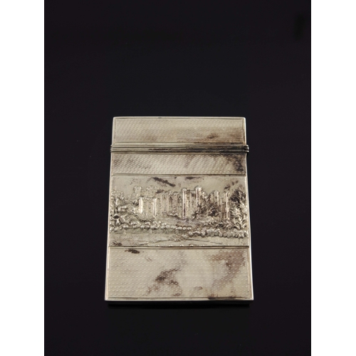 132 - A Victorian silver castle embossed card case, Nathaniel Mills, Birmingham 1851, rectangular with eng... 