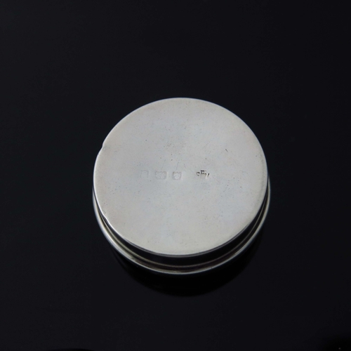 133 - An Edwardian silver and enamelled pill box, Birmingham 1906, circular, with cream guilloche enamel a... 