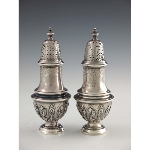 137 - A pair of Victorian silver casters, Robert Garrard II, London 1856, cast baluster form, engraved wit... 