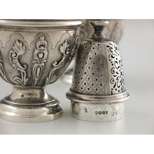 137 - A pair of Victorian silver casters, Robert Garrard II, London 1856, cast baluster form, engraved wit... 