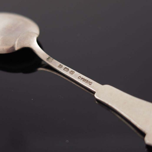 143 - Archibald Knox for Liberty and Co., a Cymric Arts and Crafts silver and enamelled Sarepta teaspoon, ... 