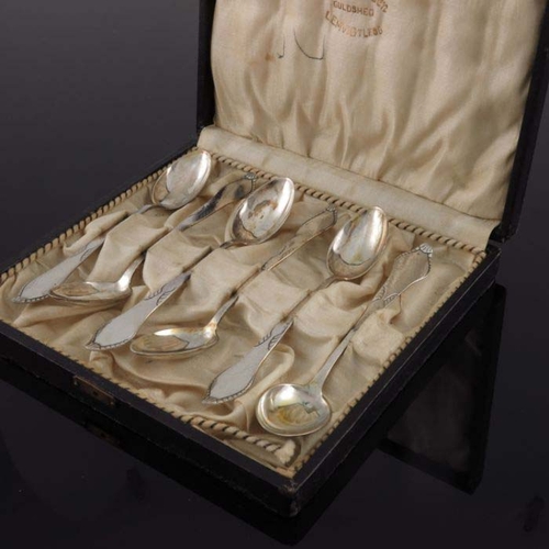 156 - Nils Christensen, a set of six Danish Secessionist silver teaspoons, Copenhagen 1924, ogee dog nose ... 